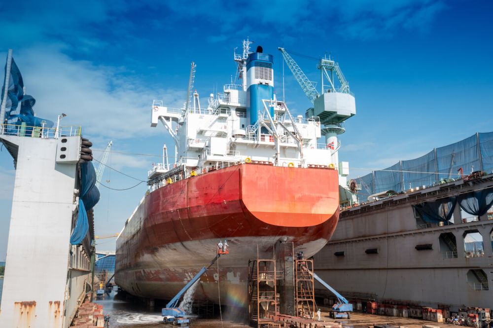The hull painting consists of washing, blasting and painting of the vessel cargo ship by operator at international dry dock