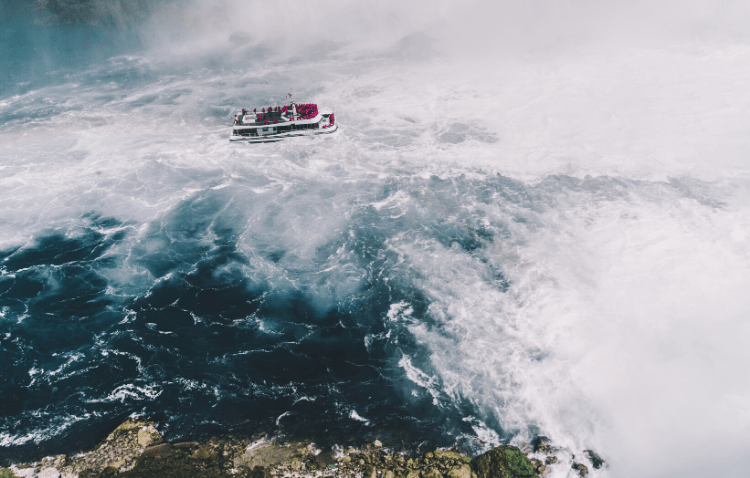 boat going through rough water